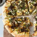 Pizza with Mozzarella, Caramelized Onions and a Smoked Gouda Cream Sauce
