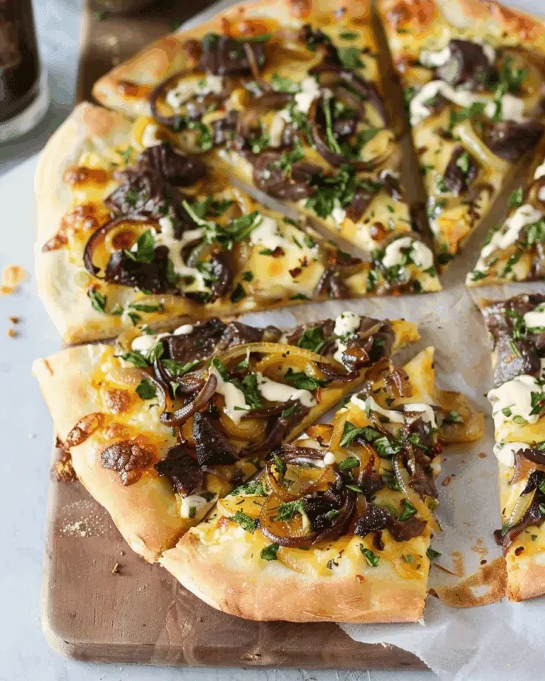 Pizza with Mozzarella, Caramelized Onions and a Smoked Gouda Cream Sauce