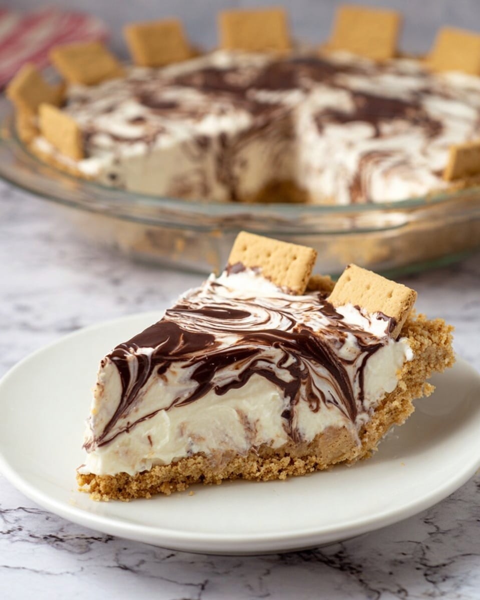 A slice of pie is shown on a white plate with a thick, crumbly light brown crust at the bottom. Above the crust is a creamy white layer with swirls of dark chocolate spread on top, creating a marbled effect. The pie slice is topped with five square-shaped brown crackers standing upright along the back edge. In the background, the whole pie with the same layers and chocolate swirls is visible in a clear glass pie dish. The setting has a white marbled texture surface. Photo taken with an iphone --ar 4:5 --v 7