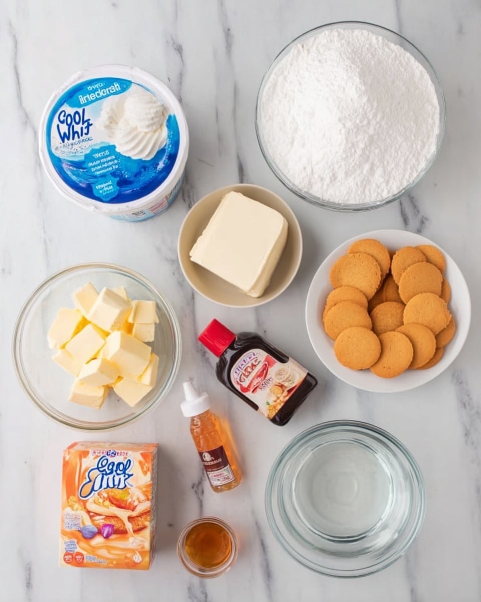 The image shows an overhead view of various ingredients arranged on a white marbled surface. The ingredients include a round container of Cool Whip with a blue label on the left, a clear glass bowl filled with white powdered sugar above it, and a clear plate holding a block of cream cheese to the right. Below these are a small white bowl filled with sliced butter, a small bottle of orange flavor extract, a small bottle of red food color, a box of orange JELL-O gelatin mix, a small glass cup with a light brown liquid, a glass bowl of round golden-brown vanilla wafer cookies, and a clear glass measuring cup with water. Everything is neatly placed, showing all components needed for a dessert. Photo taken with an iphone --ar 4:5 --v 7