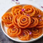 Delicious Homemade Jalebi with Cardamom Saffron Syrup and Pistachio Garnish Recipe