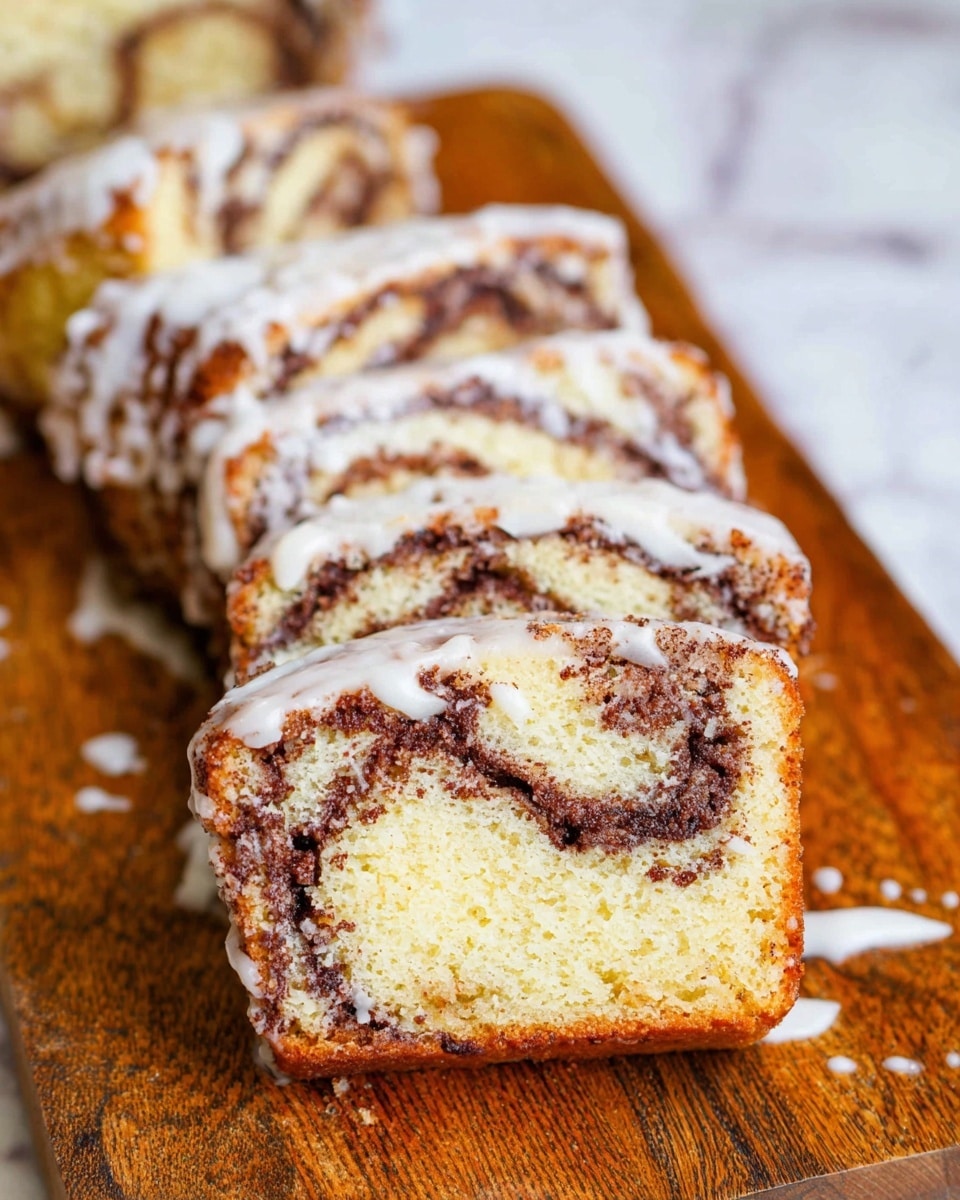 The image shows several slices of cinnamon swirl cake placed on a wooden board. Each slice has two main layers: a light golden-brown cake base and a darker swirl of cinnamon brown running through the middle and top, creating a marbled pattern. The edges of the slices are coated with a thick white glaze that drips slightly unevenly, adding texture and contrast. The slices are arranged in a slightly overlapping line, showing the swirl pattern clearly. The background is a white marbled texture. photo taken with an iphone --ar 4:5 --v 7
