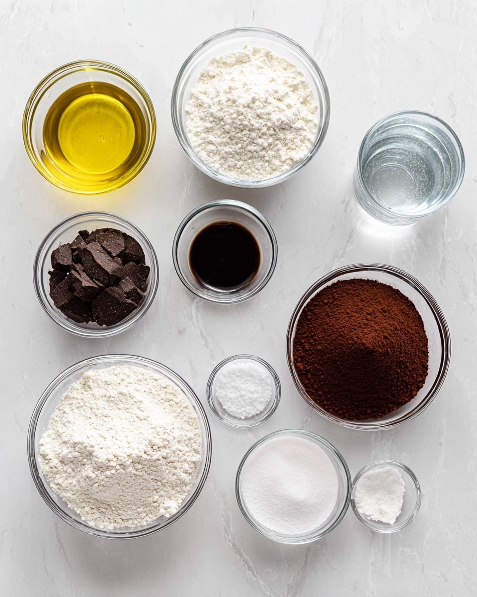 A top view of several clear glass bowls placed on a white marbled surface, each filled with different baking ingredients. In the center is a small bowl with dark brown vanilla extract. Surrounding it are medium bowls filled with white flour, dark brown cocoa powder, and white sugar. There are also small bowls containing baking soda, salt, and a clear liquid, likely vinegar or similar. A larger glass holds water on the upper right, and a bowl with a golden-yellow liquid, likely oil, sits to the left. All bowls are neatly arranged with clean edges, showing textures of powders and liquids clearly. Photo taken with an iphone --ar 4:5 --v 7