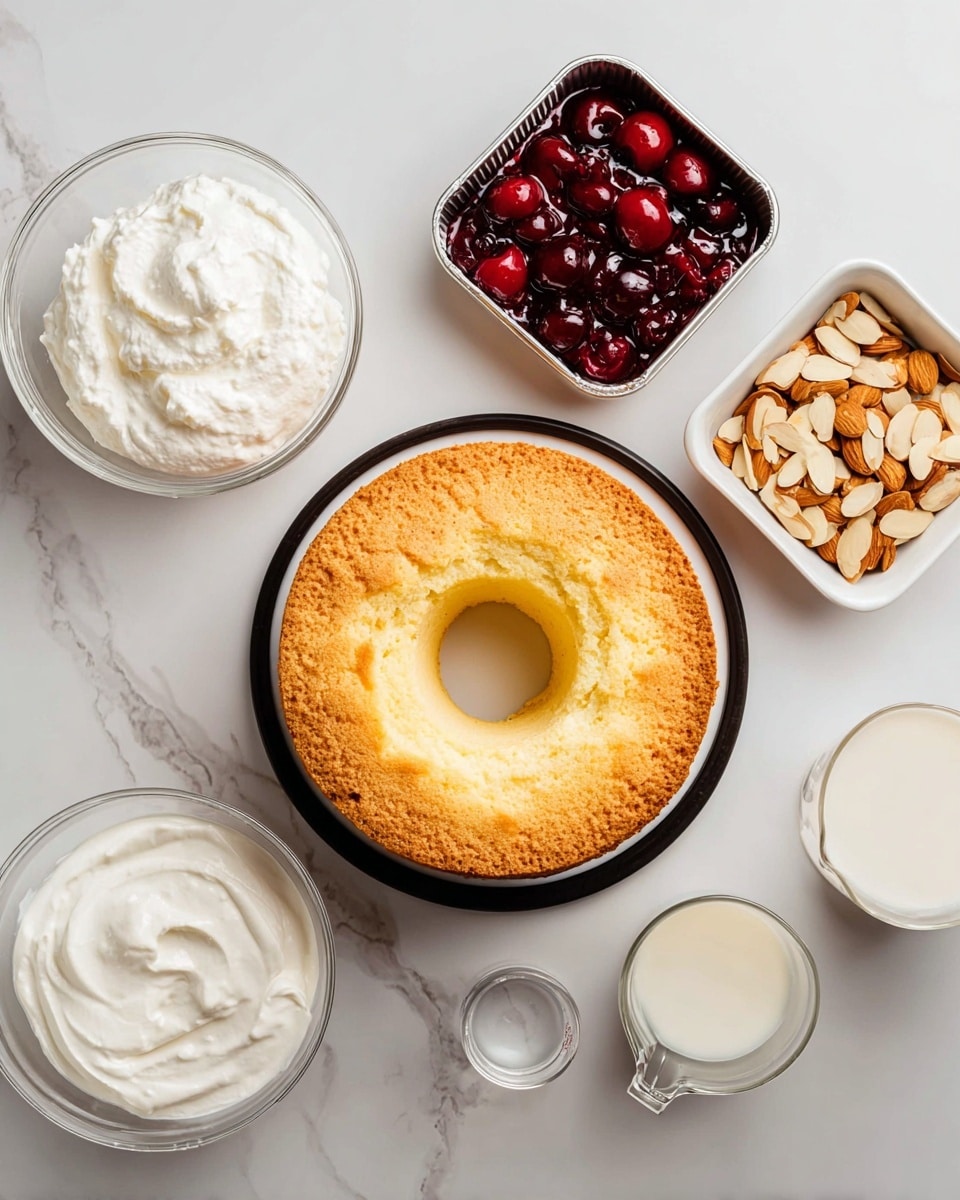 A round yellow cake with a hole in the middle rests on a white plate with a black center. Around the cake, there are several small containers: a glass bowl with white whipped cream on the bottom left, a silver tin open with bright red cherries in syrup on the top left, a small square white bowl with light brown sliced almonds on the top right, a clear glass cup filled with smooth white cream on the middle right, and a clear measuring cup with milk on the bottom right. All items are placed on a white marbled surface, with a small glass measuring cup of clear liquid near the bottom center. Photo taken with an iphone --ar 4:5 --v 7