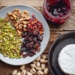 Baked Brie with Fig Jam, Dried Figs, Pistachios, and Walnuts Recipe
