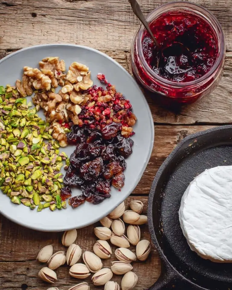 Baked Brie with Fig Jam, Dried Figs, Pistachios, and Walnuts Recipe