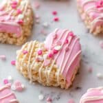Heart Shaped Rice Krispie Treats with Pink and White Chocolate Drizzle Recipe