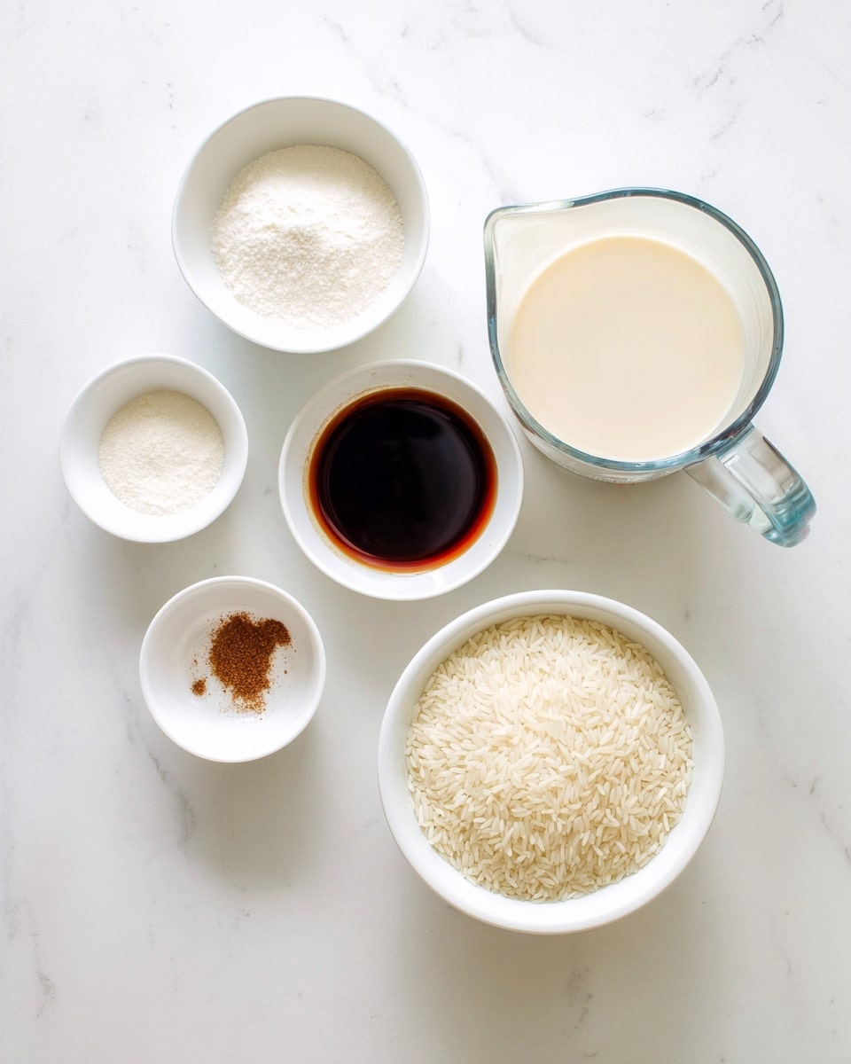 The image shows six white bowls and a glass measuring cup, all arranged on a white marbled surface. The largest item is the glass pitcher filled with a creamy white liquid, placed on the right side. Below it is a white bowl filled with uncooked white rice grains. Above and to the left, four smaller white bowls hold different ingredients: the topmost has a white granulated powder, below it to the right is a dark brown liquid, below that is a small bowl with a brown spice powder, and at the bottom left is a bowl with a white granular substance. The setup is neat and bright, showing each ingredient clearly. photo taken with an iphone --ar 4:5 --v 7