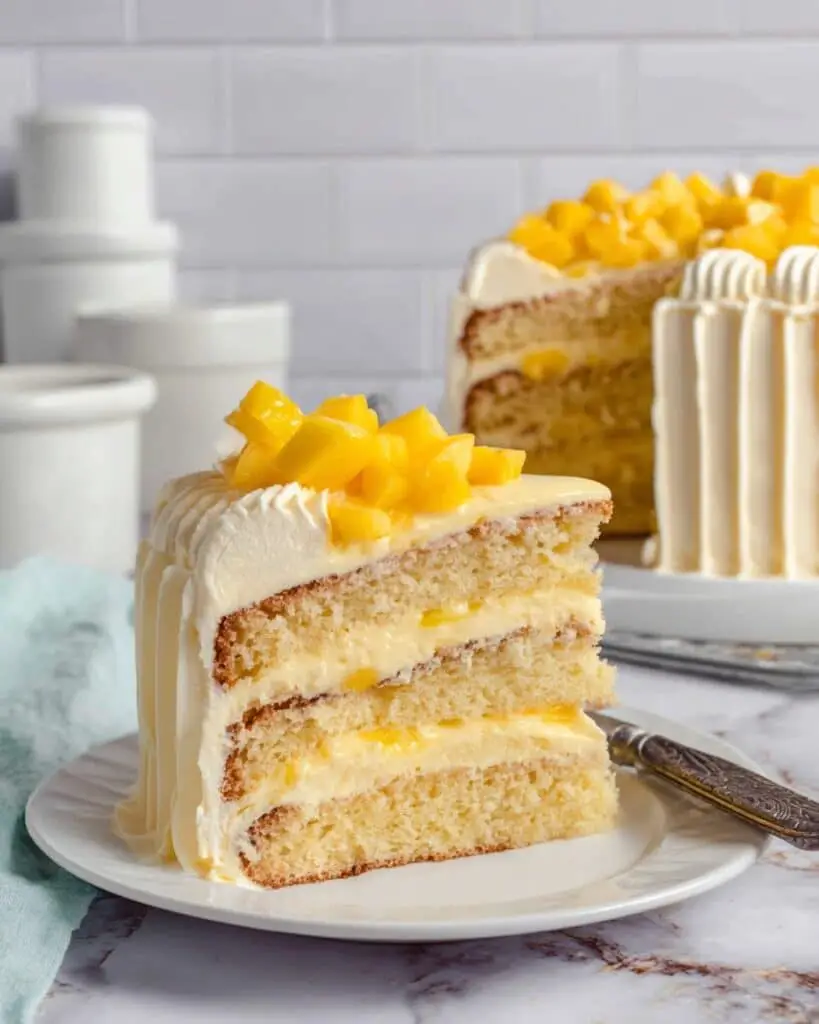 Mango Cake with Cream Cheese Frosting and Fresh Mango Garnish Recipe