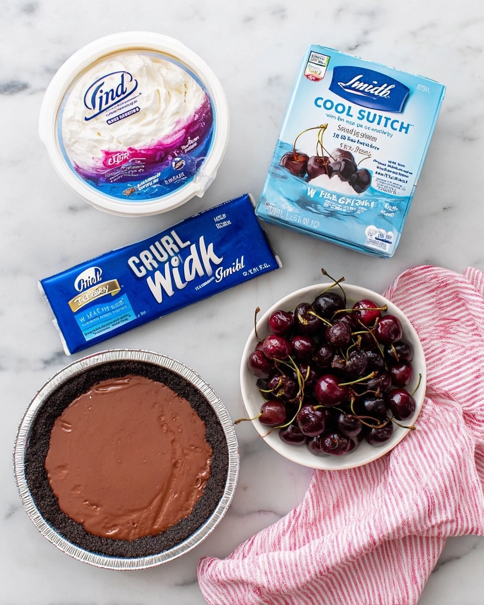 The image shows five items arranged on a white marbled surface with a pink and white striped cloth on the right. In the center bottom is a round chocolate snap pie crust in a foil pan with a blue label. To the left of it is a bar of Lindt milk chocolate in a mostly blue wrapper with white milk pouring on it. Above the chocolate is a round white container of Cool Whip zero sugar with a blue and purple lid featuring a dollop of whipped topping with dark berries. To the right of the Cool Whip is a small white bowl filled with dark red cherries, some with stems. Above the bowl of cherries is a small blue box of Great Value sugar-free black cherry gelatin dessert with an image of dark cherry gelatin. The photo taken with an iphone --ar 4:5 --v 7