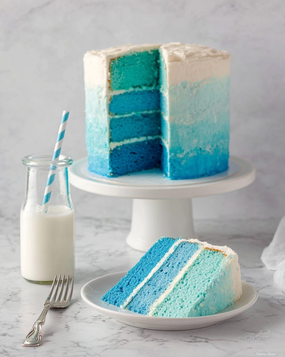 A three-layer round cake is displayed with a slice removed, showing three layers of blue sponge cake in different shades from light blue at the top to a darker blue at the bottom, each separated by thin white frosting layers. The outside of the cake is coated in smooth white frosting with a slight blue tint at the bottom. One slice of the cake is placed on a white plate in the foreground, showing the same three blue layers and white frosting between them. A small glass bottle of milk with a blue and white striped straw is to the left of the plate, and a silver fork lies on the white marbled surface next to the plate. The cake is set on a white cake stand, and the background features a white marbled texture. photo taken with an iphone --ar 4:5 --v 7