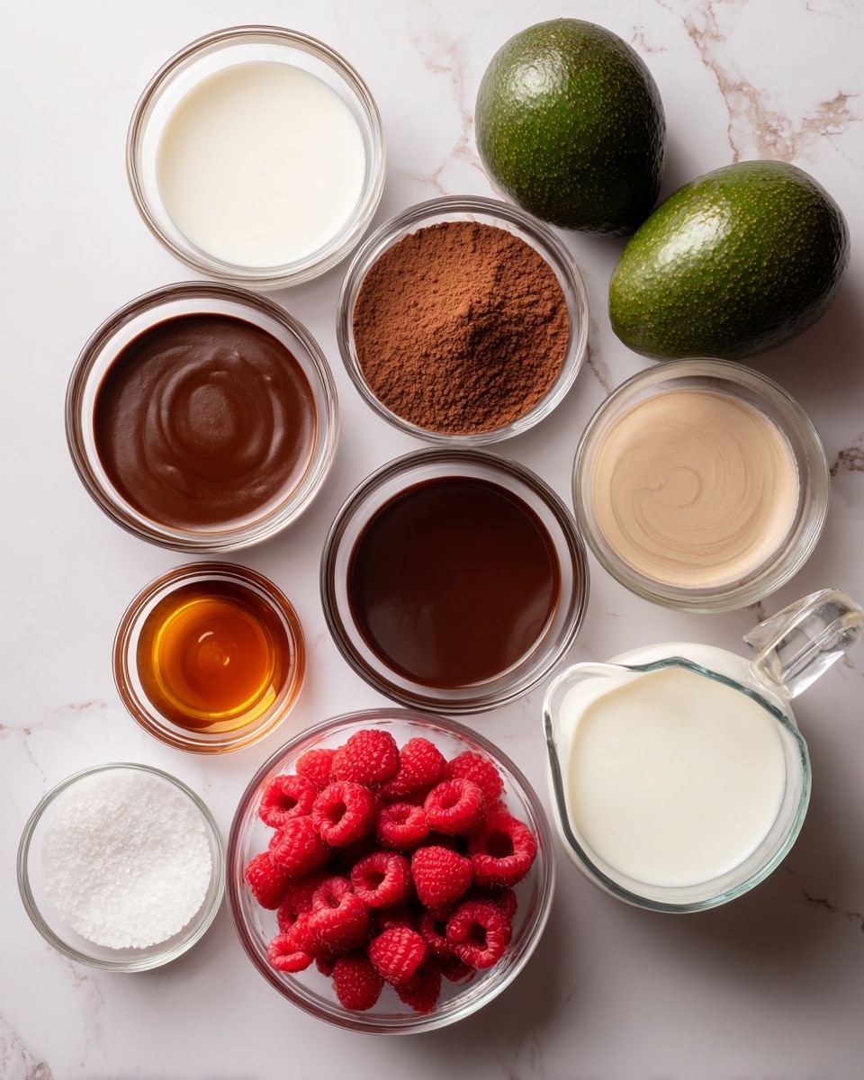 The image shows a white marbled surface with nine small clear glass bowls and two whole dark green avocados. The bowls contain a variety of ingredients: one has a white creamy liquid, another has a fine brown cocoa powder, one holds a smooth dark brown chocolate sauce, a smaller bowl contains amber-colored syrup, another has light brown vanilla extract, a separate bowl is filled with bright red raspberries, and one measuring cup holds white milk. There is also a small bowl with a white powdery substance, possibly salt. The bowls are arranged randomly but neatly, showing a mix of smooth, powdery, and fresh textures. Photo taken with an iphone --ar 4:5 --v 7
