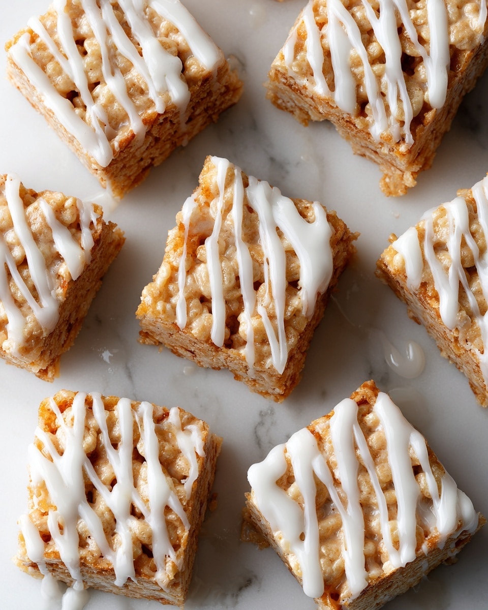 The image shows six square crispy rice treats with a light golden-brown color, stacked close together on a white marbled surface. Inside each treat, there are dark pieces that look like small cookie bits, creating a contrast with the light crispy rice layer. The top of the treats is decorated with thin white drizzle lines of icing, unevenly spread, which add a smooth creamy texture on top of the crunchy base. The treats are thick and have a rough, porous texture on their sides. Photo taken with an iphone --ar 4:5 --v 7